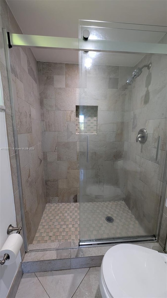 1001 Hillcrest Ct Unit 303, Hollywood, FL 33021 - full bathroom with a stall shower and toilet