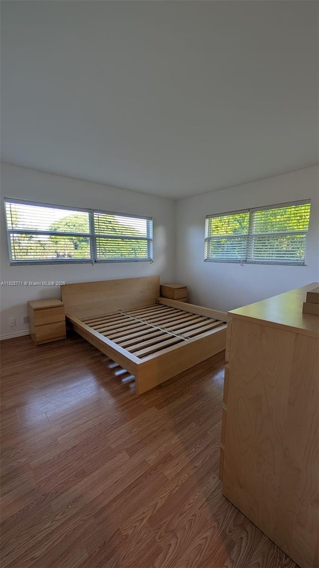 1001 Hillcrest Ct Unit 303, Hollywood, FL 33021 - unfurnished bedroom with wood finished floors