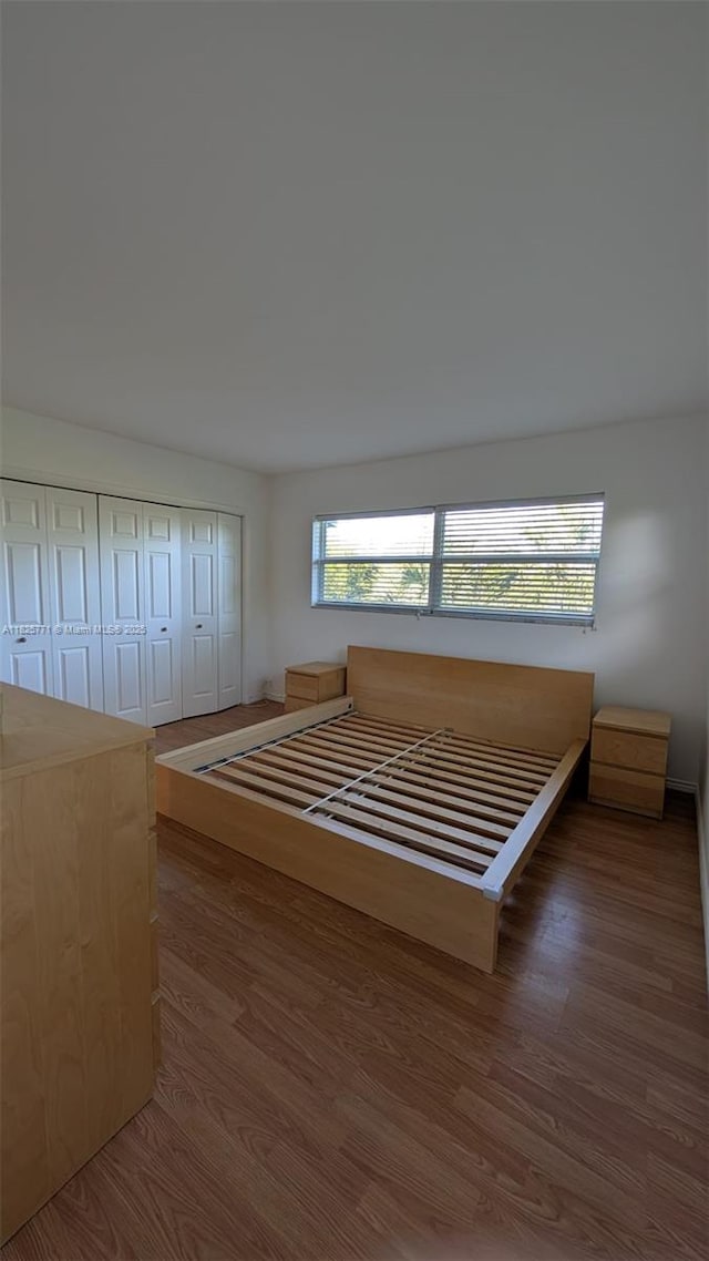 1001 Hillcrest Ct Unit 303, Hollywood, FL 33021 - bedroom featuring wood finished floors