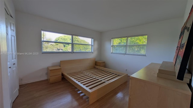 1001 Hillcrest Ct Unit 303, Hollywood, FL 33021 - unfurnished bedroom with wood finished floors
