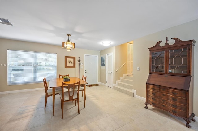 10220 SW 108th St, Miami, FL 33176 - dining room with stairway and light tile patterned floors