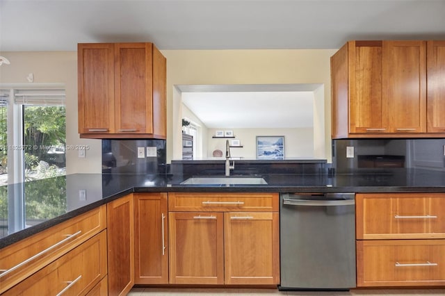 10220 SW 108th St, Miami, FL 33176 - kitchen with dishwasher, dark stone counters, brown cabinets, and decorative backsplash