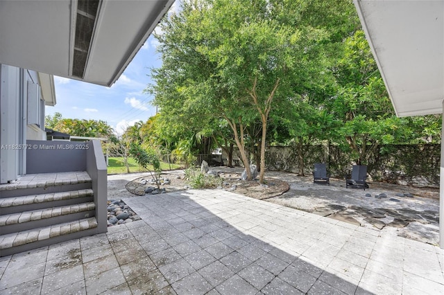 10220 SW 108th St, Miami, FL 33176 - fenced backyard featuring a patio area