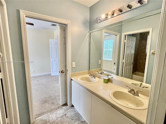 1379 NW 166th Ave, Pembroke Pines, FL 33028 - bathroom featuring double vanity and marble look tile flooring