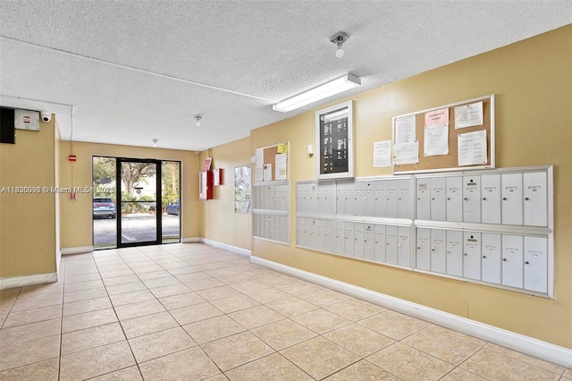 6555 W Broward Blvd Unit 208, Plantation, FL 33317 - surrounding community featuring mail area and a textured ceiling