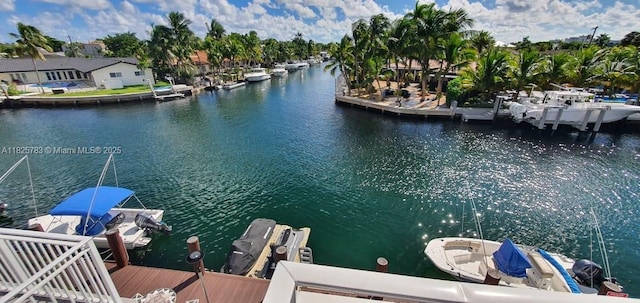 2430 NE 135th St Unit 304, North Miami, FL 33181 - dock featuring a water view