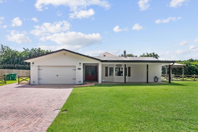 1550 NW 114th Ave, Plantation, FL 33323 - single story home with an attached garage, decorative driveway, and stucco siding