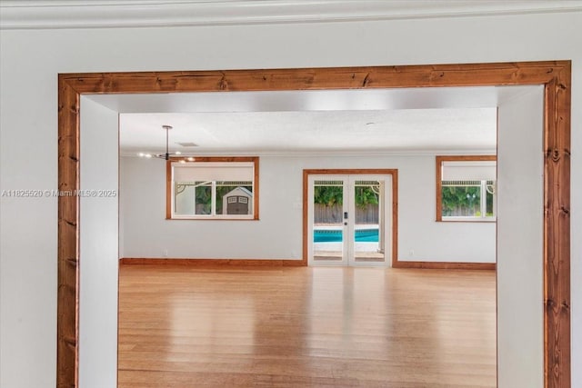 1550 NW 114th Ave, Plantation, FL 33323 - spare room featuring wood finished floors and french doors