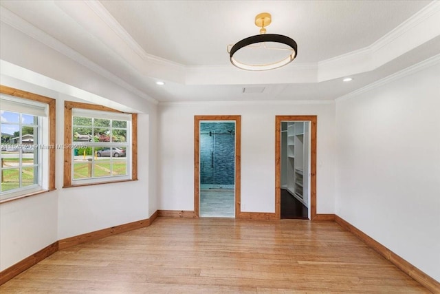 1550 NW 114th Ave, Plantation, FL 33323 - spare room featuring a tray ceiling, light wood-type flooring, recessed lighting, and ornamental molding