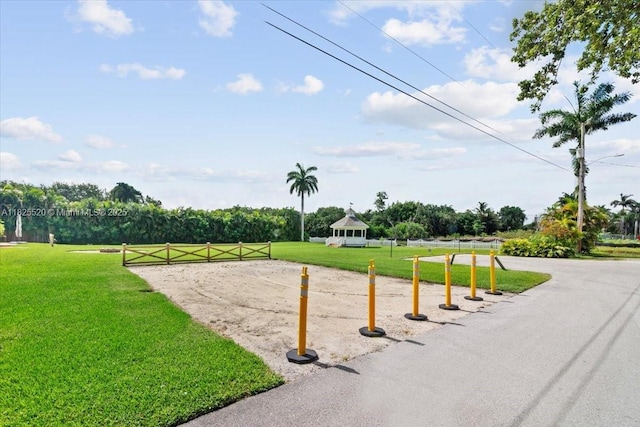 1550 NW 114th Ave, Plantation, FL 33323 - view of community with a yard