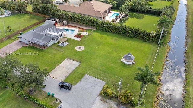 1550 NW 114th Ave, Plantation, FL 33323 - view from above of property featuring a pool and a large body of water