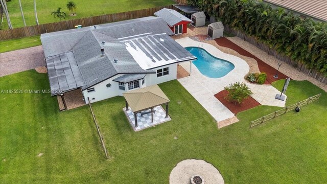 1550 NW 114th Ave, Plantation, FL 33323 - aerial view of property and surrounding area featuring a pool