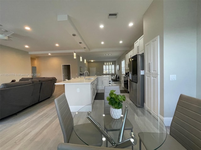 1087 Chenille Cir, Weston, FL 33327 - dining space featuring recessed lighting, light wood-style flooring, and ceiling fan