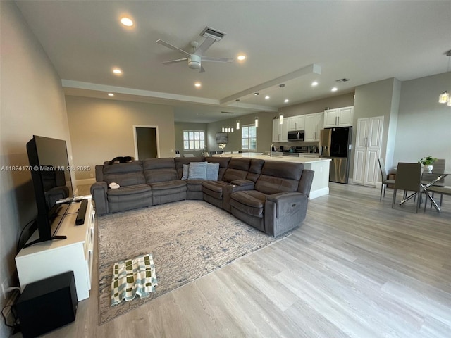 1087 Chenille Cir, Weston, FL 33327 - living room featuring light wood finished floors, ceiling fan, and recessed lighting