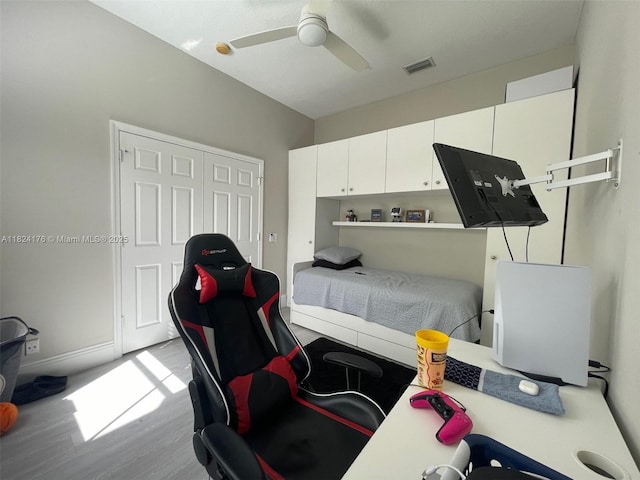 1087 Chenille Cir, Weston, FL 33327 - bedroom featuring wood finished floors, a closet, and a ceiling fan