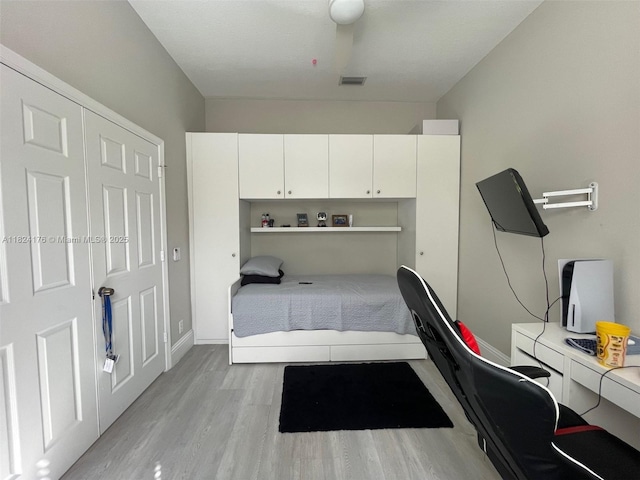 1087 Chenille Cir, Weston, FL 33327 - bedroom with light wood-style floors and a desk