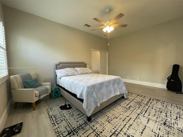 1087 Chenille Cir, Weston, FL 33327 - bedroom featuring wood finished floors and ceiling fan