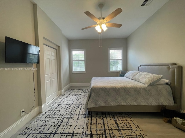 1087 Chenille Cir, Weston, FL 33327 - bedroom featuring a ceiling fan and a closet