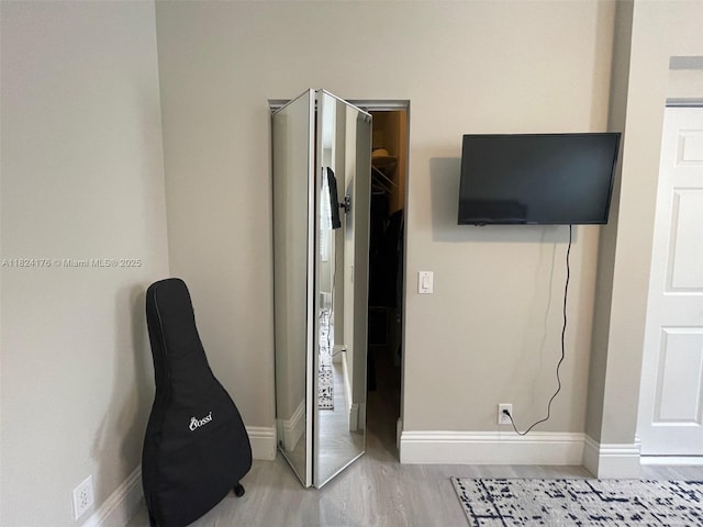 1087 Chenille Cir, Weston, FL 33327 - unfurnished bedroom with baseboards and wood finished floors