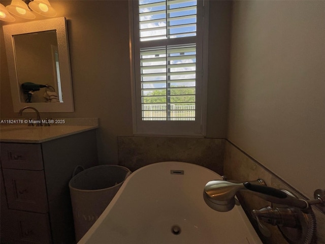 1087 Chenille Cir, Weston, FL 33327 - bathroom with a freestanding bath and vanity