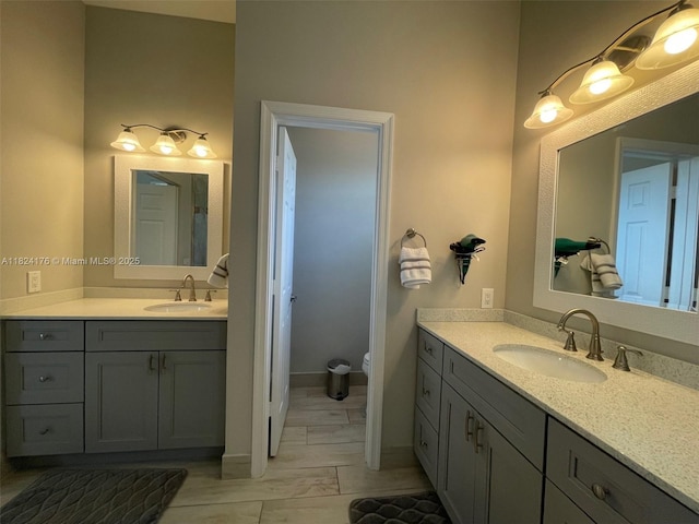 1087 Chenille Cir, Weston, FL 33327 - full bathroom with two vanities and toilet