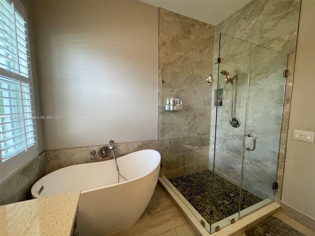 1087 Chenille Cir, Weston, FL 33327 - bathroom featuring a soaking tub and a stall shower