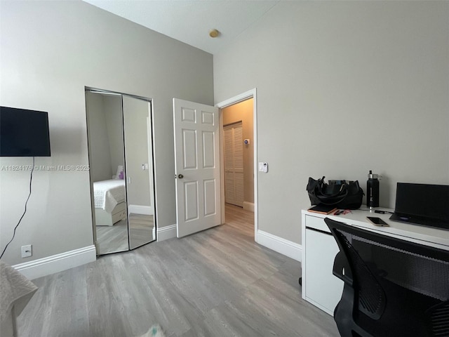1087 Chenille Cir, Weston, FL 33327 - office area with light wood finished floors and a towering ceiling
