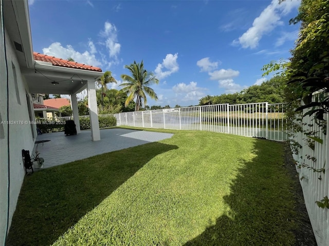 1087 Chenille Cir, Weston, FL 33327 - fenced backyard featuring a water view and a patio