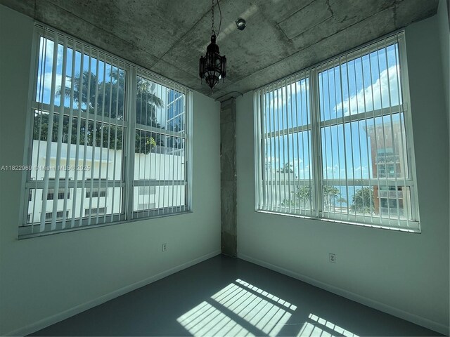 2001 Biscayne Blvd Unit 2402, Miami, FL 33137 - empty room with baseboards and a chandelier