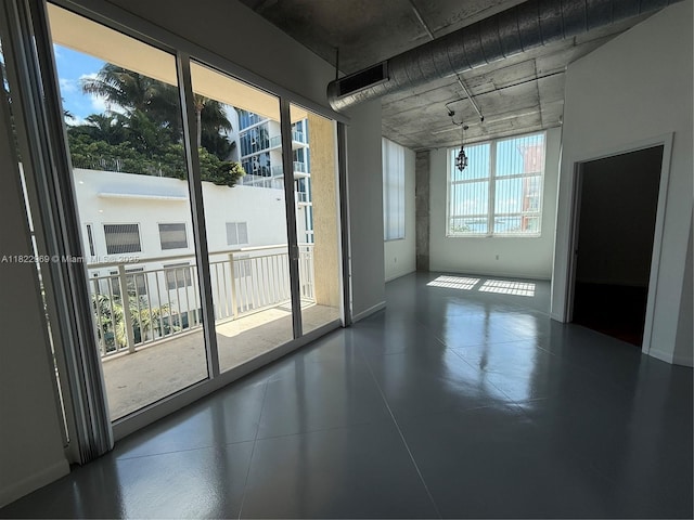 2001 Biscayne Blvd Unit 2402, Miami, FL 33137 - spare room featuring baseboards