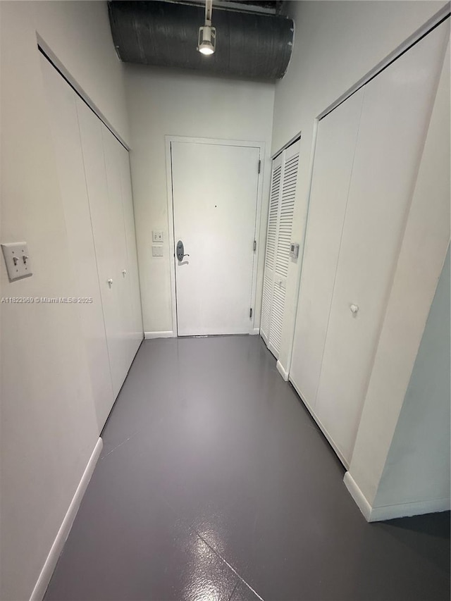 2001 Biscayne Blvd Unit 2402, Miami, FL 33137 - hall with concrete flooring and baseboards