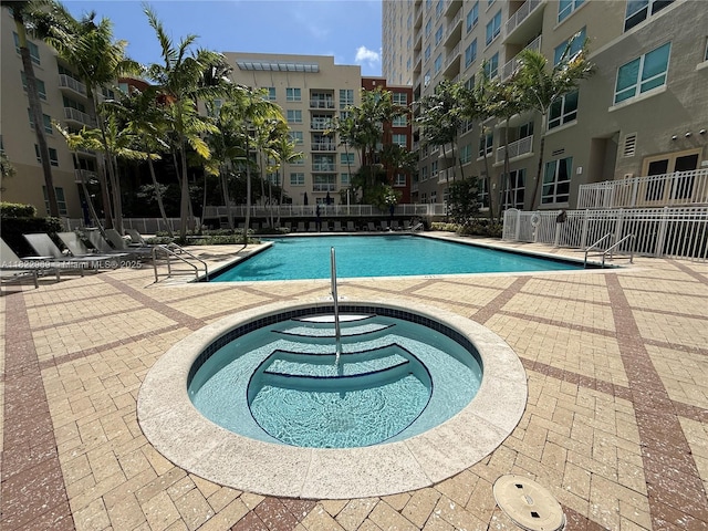 2001 Biscayne Blvd Unit 2402, Miami, FL 33137 - community pool featuring a community hot tub and a patio area