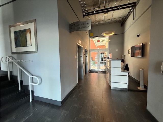 2001 Biscayne Blvd Unit 2402, Miami, FL 33137 - corridor with a high ceiling, dark wood finished floors, and elevator