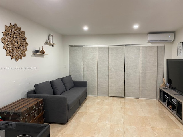 19001 NE 14th Ave Unit 325, Miami, FL 33179 - living area featuring an AC wall unit, recessed lighting, and light tile patterned flooring