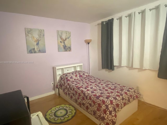 19001 NE 14th Ave Unit 325, Miami, FL 33179 - bedroom with wood finished floors