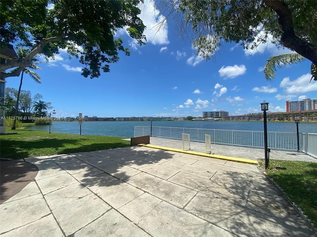 19001 NE 14th Ave Unit 325, Miami, FL 33179 - view of home's community with a lawn and a water view