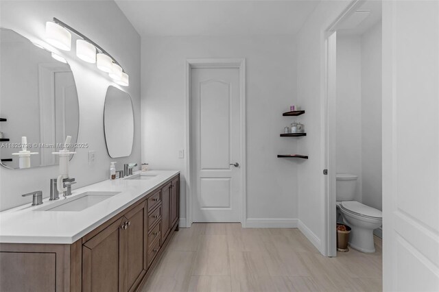 452 NE 20th Ter, Homestead, FL 33033 - full bathroom featuring double vanity and toilet