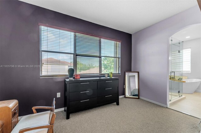 452 NE 20th Ter, Homestead, FL 33033 - sitting room featuring arched walkways and light colored carpet
