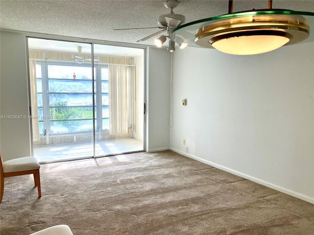 9041 Sunrise Lakes Blvd Unit 208, Sunrise, FL 33322 - spare room with carpet flooring, a textured ceiling, and ceiling fan
