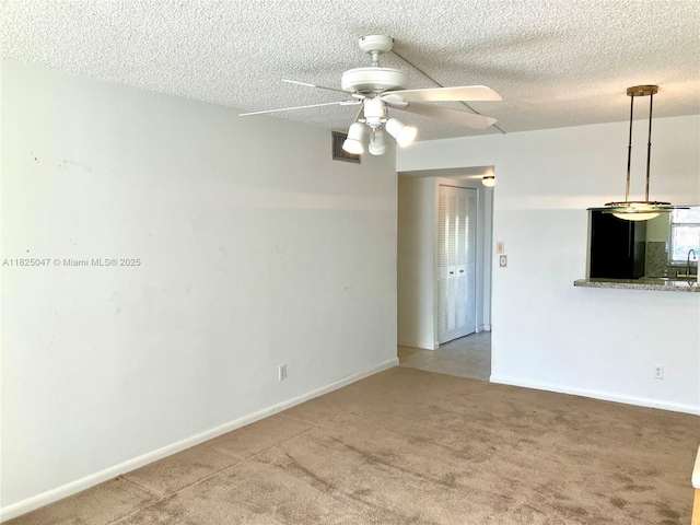 9041 Sunrise Lakes Blvd Unit 208, Sunrise, FL 33322 - carpeted spare room with ceiling fan and a textured ceiling