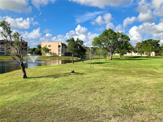 9041 Sunrise Lakes Blvd Unit 208, Sunrise, FL 33322 - view of home's community featuring a water view and a yard