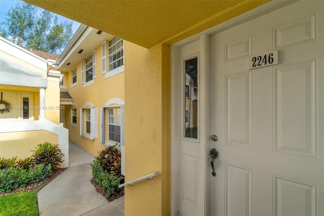 2246 SE 27th Dr Unit 204-D, Homestead, FL 33035 - doorway to property with stucco siding