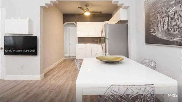 1325 Meridian Ave Unit 6, Miami Beach, FL 33139 - dining space with light wood-style flooring and ceiling fan