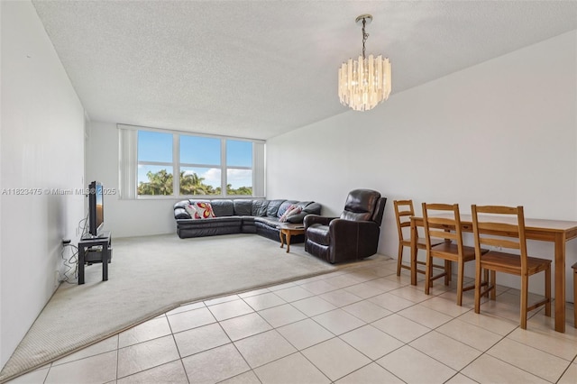 900 Saint Charles Pl Unit 420, Pembroke Pines, FL 33026 - living room with light carpet, a chandelier, a textured ceiling, and light tile patterned flooring