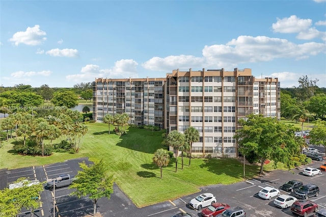 900 Saint Charles Pl Unit 420, Pembroke Pines, FL 33026 - view of apartment building / complex featuring uncovered parking