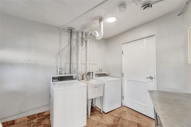 1750 NE 191st St Unit 106-1, Miami, FL 33179 - laundry area featuring washing machine and clothes dryer