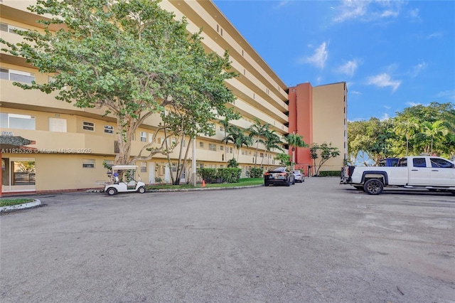 1750 NE 191st St Unit 106-1, Miami, FL 33179 - view of property with uncovered parking