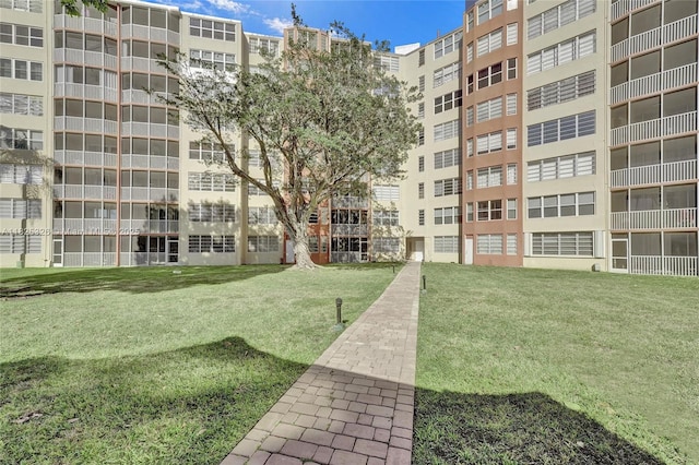 1750 NE 191st St Unit 106-1, Miami, FL 33179 - view of property's community featuring a lawn