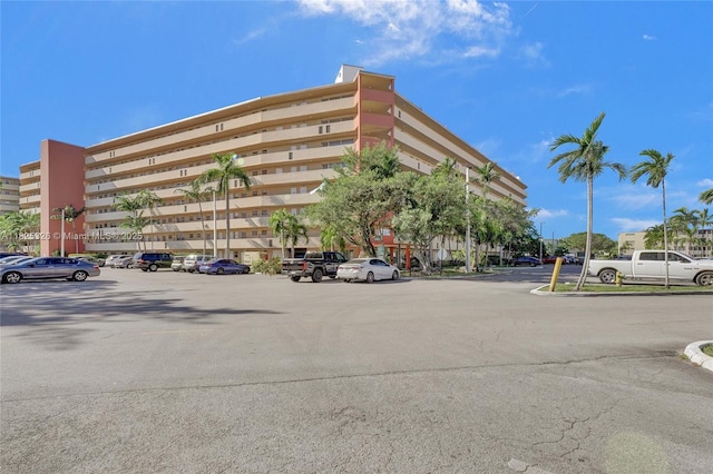 1750 NE 191st St Unit 106-1, Miami, FL 33179 - view of property featuring uncovered parking