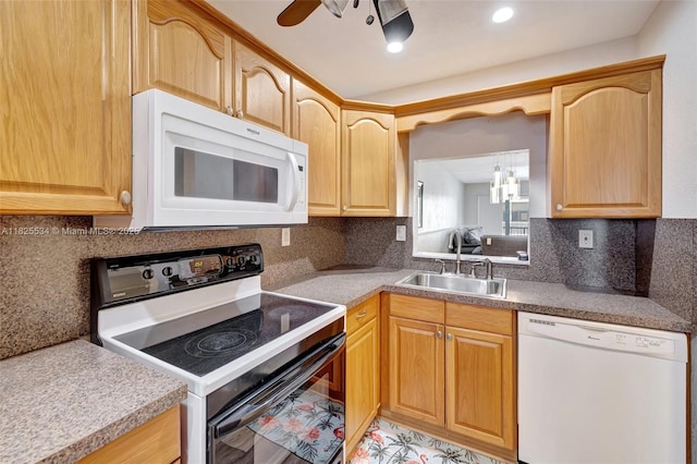 2097 S Ocean Unit 207, Hallandale Beach, FL 33009 - kitchen with white appliances, ceiling fan, decorative backsplash, and light brown cabinetry